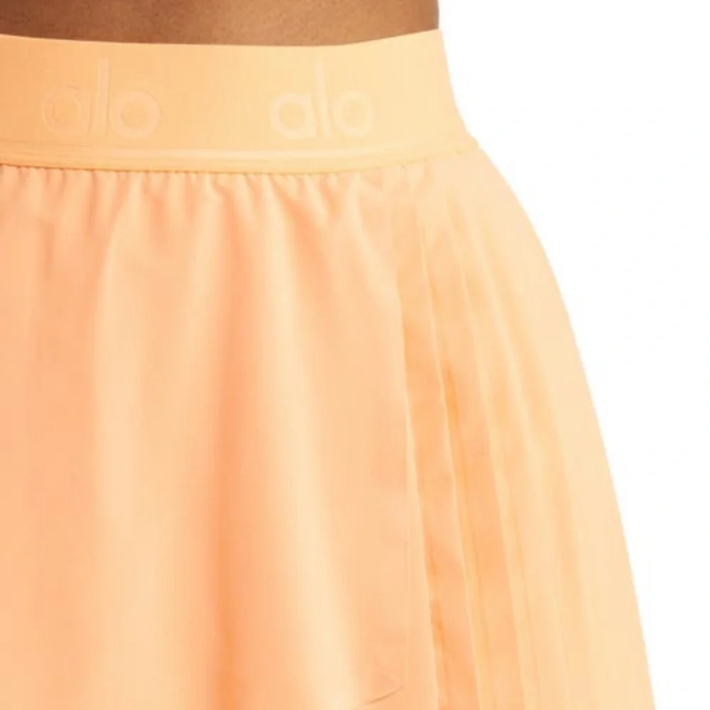 NWT ALO Aces pleated Tennis Skirt size small - cantaloupe